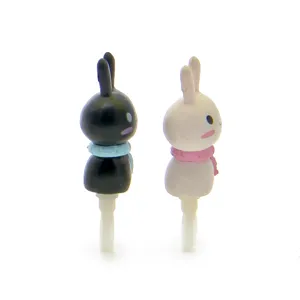 Cute cartoon rabbit couple design 3.5mm universal dust plug accessory for mobile phones.