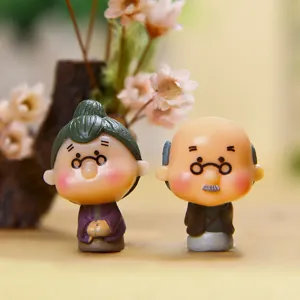 Detailed close-up of cute elderly couple miniature figurines, perfect for micro landscape decor.