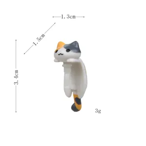 Cute calico cat dust plug for 3.4mm headphone jack, adorable phone accessory and decoration.