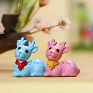 Cute couple deer resin figurine detailed view showing vibrant colors and sweet scarf design.