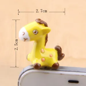 Cartoon pony 3.5mm dust plug detail view, cute yellow animal headphone jack accessory.