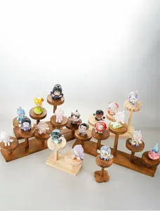Detailed view of walnut wooden multi-tier display stand for jewelry and action figures.