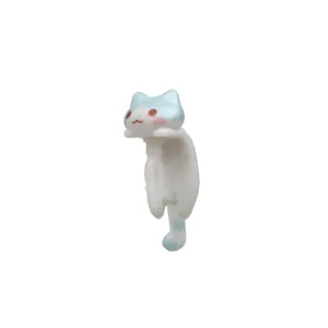 Cute blue and white cat design earphone jack dust plug and cable protector detail view
