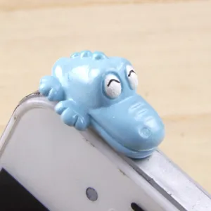 Cute blue crocodile phone dust plug cartoon smartphone accessory lovely decorative item detail shot