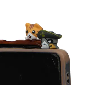 Cute cat phone dust plug, adorable cartoon anime kitten figurine for smartphone decoration.