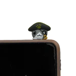 Cute pirate cat phone dust plug detail shot, anime cartoon character mobile accessory