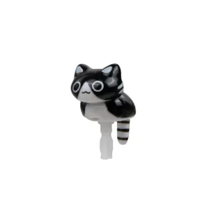 Cute black and white cat phone dust plug, adorable climbing design for smartphone accessories.