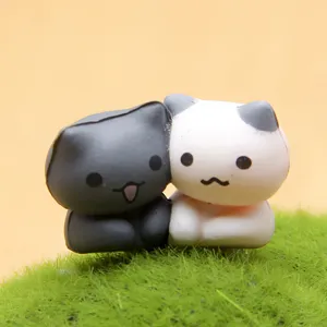 Schattige kattenfiguren miniatuur hars bureau ornamenten cartoon telefoon stofplug decor