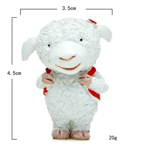Detailed view of cute resin sheep figurine with red backpack for miniature garden decor.