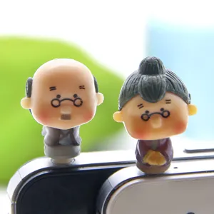 Cute elderly couple design 3.5mm dust plug, adorable cartoon phone accessory detail.