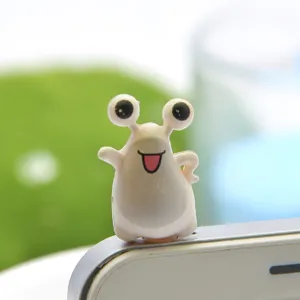 Cute cartoon big-eyed monster 3.5mm dust plug accessory for phones, lovely design.