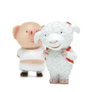 Close-up detail of cute zodiac sheep and pig figurines, perfect for DIY micro landscape decor.