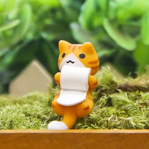 Leuke oranje kat figuur met papierrol bureau decoratie micro landschap miniatuur speelgoed