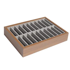 Walnut finish multi-slot jewelry display tray with grey velvet interior for jade bracelets.