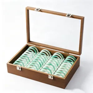 Wooden storage box with clear glass lid and multiple slots, perfect for displaying jade bangles.