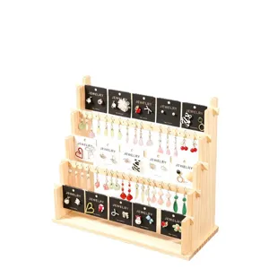 Hölzerner mehrstufiger Ohrring-Display-Ständer Schmuckhalter Organizer für den Tischverkauf.