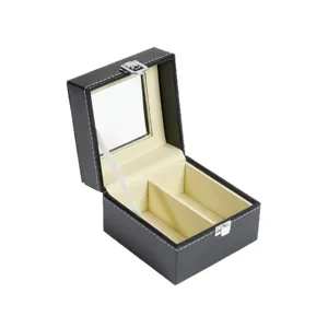 Black PU leather watch storage box with glass lid and two slots for luxury watches.