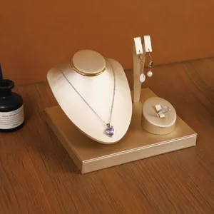 PU brushed golden jewelry display stand set, elegant necklace and ring organizer rack props.