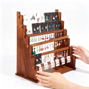 Wooden earring display stand multi-tier jewelry organizer rack for home or shop use.