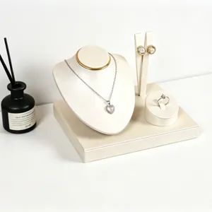 Beige leather jewelry display stand set necklace earring ring organizer showcase holder.