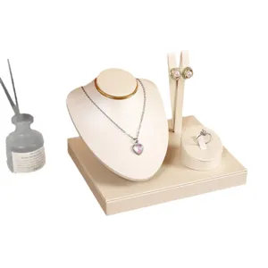 Beige PU leather jewelry display stand set, elegant functional organizer tray for rings and necklaces