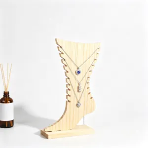 Wooden foot-shaped jewelry display stand for necklaces and anklets product main image