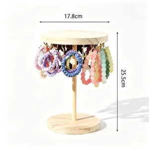 Wooden bracelet display rack with dimensions, perfect for organizing scrunchies and jewelry.