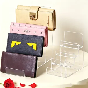 Clear acrylic multi-layer wallet display stand, tiered organizer rack for purses and phones.