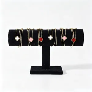 Black velvet single-layer T-bar jewelry display stand for bracelets and watches.
