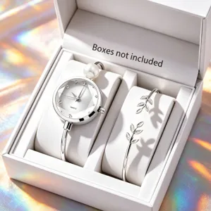 Elegante set di orologio al quarzo argentato e bracciale con foglie in confezione regalo, chic.