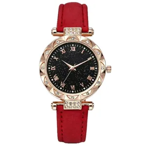 Montre à quartz élégante pour femme avec bracelet en cuir rouge et cadran étoilé chic.