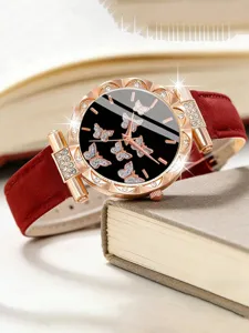 Elegante orologio da donna al quarzo con quadrante farfalla strass e cinturino in pelle rossa.