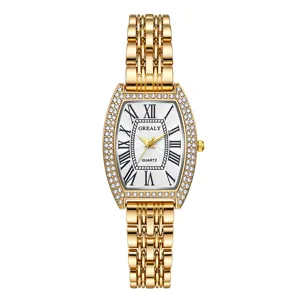 Montre quartz tonneau dorée pour femme avec lunette en diamant, cadran blanc et chiffres romains chic