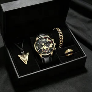 Detailed view of luxury men's black gold watch set with necklace bracelet and ring in box.