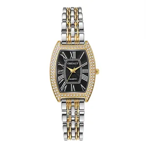 Montre quartz femme élégante avec boîtier tonneau, lunette en diamant et chiffres romains.