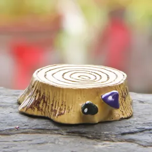 Mini resin tree stump figurine with cute colorful mushrooms for micro landscape decor.