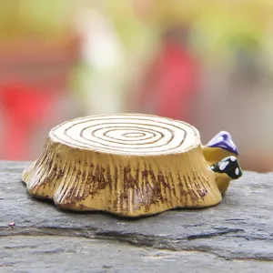 Mini resin tree stump figurine with cute mushrooms detail for micro landscape fairy garden decor.