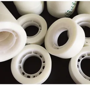 Detailed view of white invisible wedding car tape rolls, traceless and writable for decoration.
