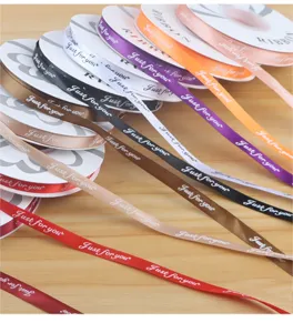 Closeup of colorful gift wrapping ribbons featuring Just for you print text details in bulk.