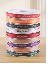 Colorful printed ribbon for flower gift packaging, DIY bouquet and cake baking decoration.