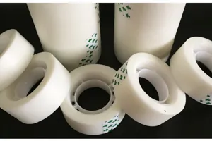 Transparent wedding car adhesive tape detail shot, showing multiple clear tape rolls.