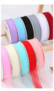 Colorful lace ribbon rolls for flower bouquets and gift wrapping, ideal for crafts.