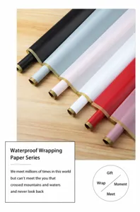 Waterproof floral wrapping paper roll with gold edge, translucent frosted bouquet wrapping material.