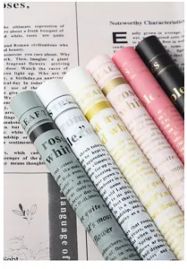 Waterproof flower wrapping paper detail, elegant English text design, floral bouquet material.