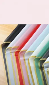 Waterproof floral wrapping paper with gold edge, colorful jelly paper for bouquet design.