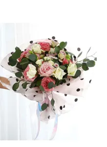 Polka dot flower wrapping paper tissue paper floral packaging detail view elegant design