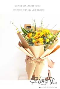 Beautiful sunflower bouquet wrapped in natural kraft paper for romantic holiday gifts and parties