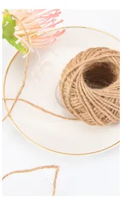 Natural jute twine rope detail close up, perfect for floral packaging, gift wrapping, and crafts.