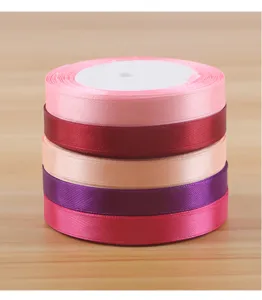Colorful satin ribbon rolls for gift wrapping, flower bouquet packaging, and DIY crafts. Premium quality.