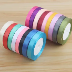 Colorful satin ribbon rolls 1cm wide for flower bouquet wrapping, gift packaging, and crafts.